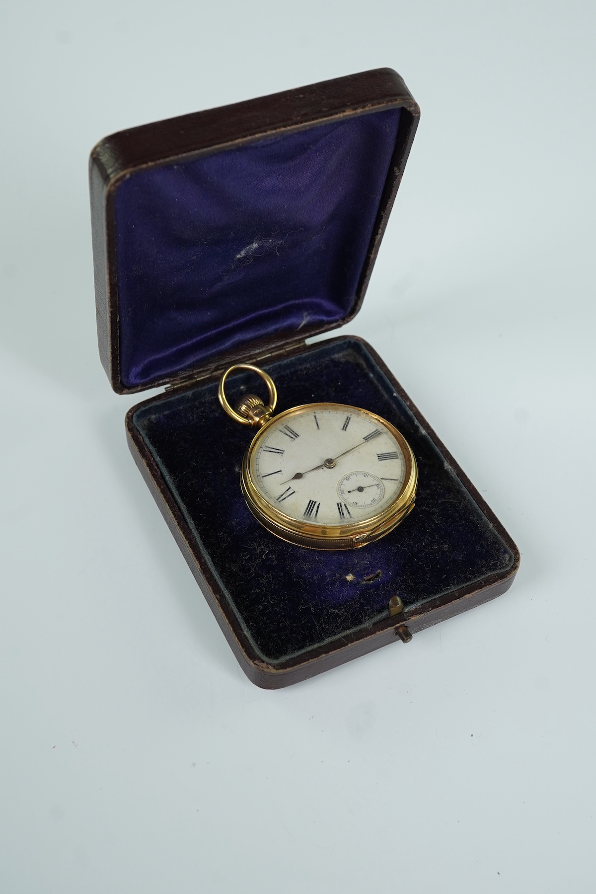 A late Victorian engine turned 18ct gold open faced keyless pocket watch by The American Waltham Watch Company